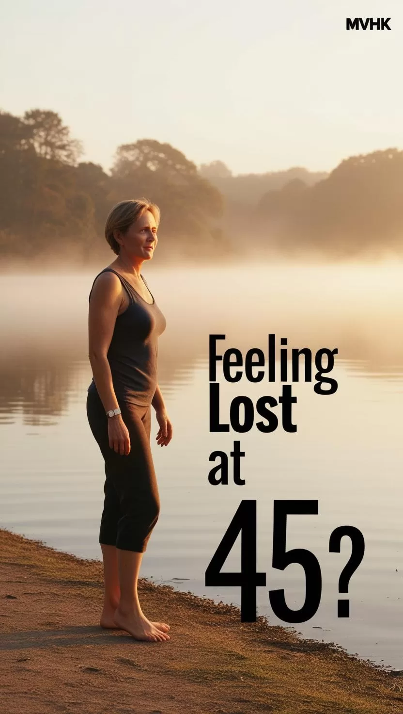 Woman standing barefoot by lake reflecting on midlife change