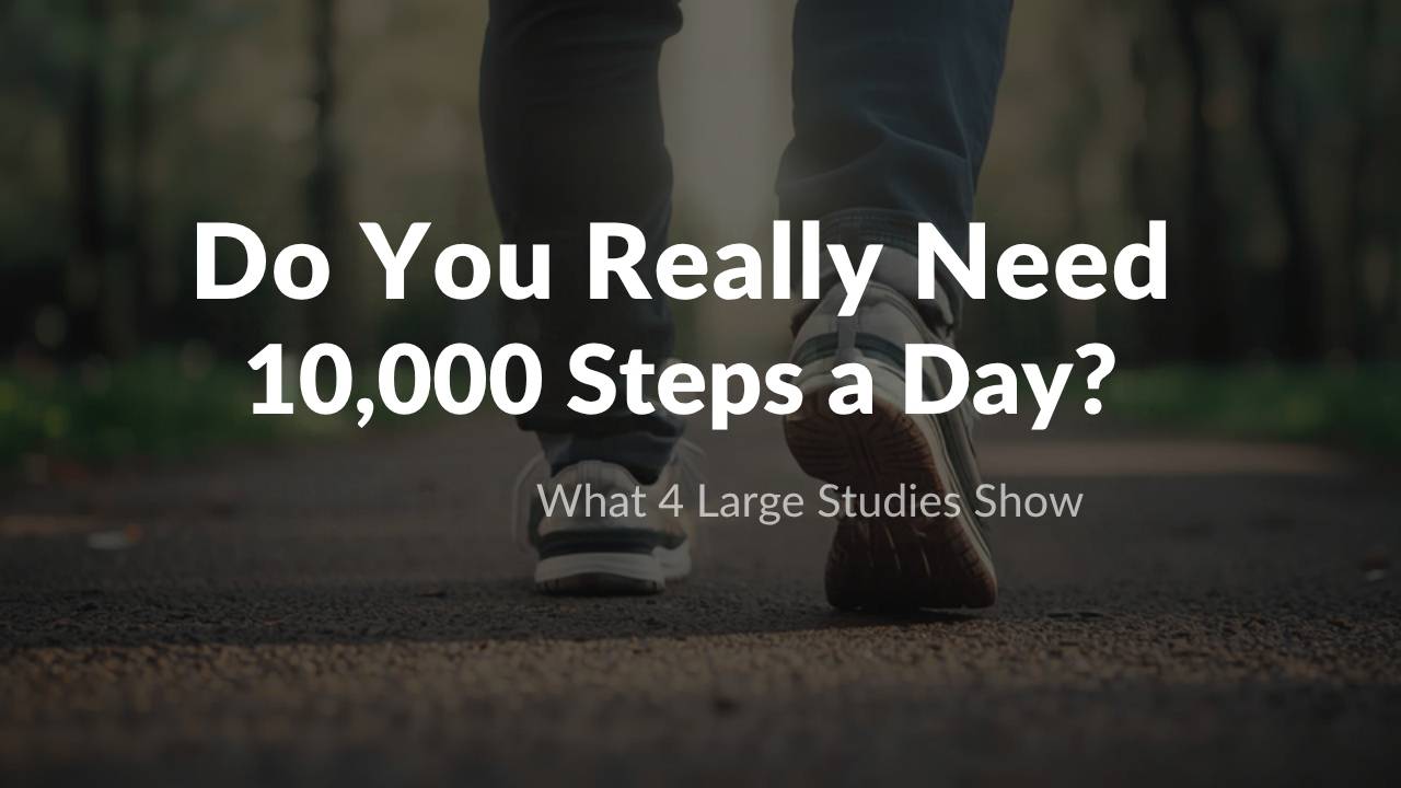 Walking shoes on a forest path in morning light with the title Do You Really Need 10,000 Steps a Day? What 4 Large Studies Show